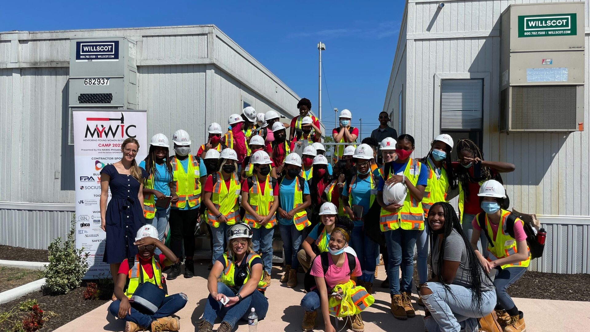 Group photo with people in construction gear